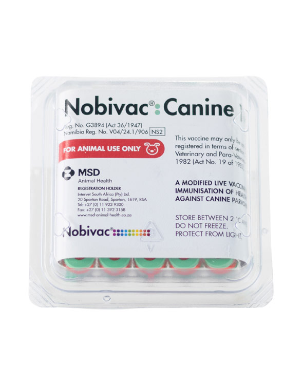 Vaccine packaging labeled "Nobivac Canine," with green vials and red warnings for animal use only and storage instructions.