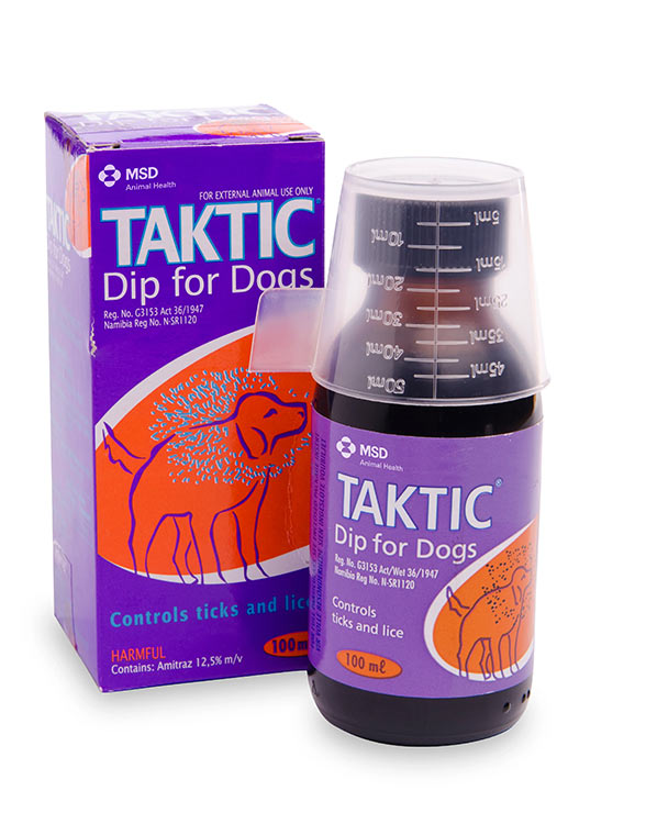 Box and bottle of Taktic dip for dogs, featuring an illustrated dog, dosage markings, and text stating it controls ticks and lice.